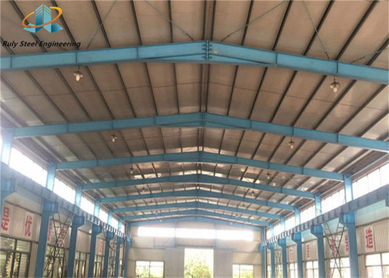 Construção pré-engenharia pré-fabricada estrutura de aço personalizada edifício com parapeito parede oficina